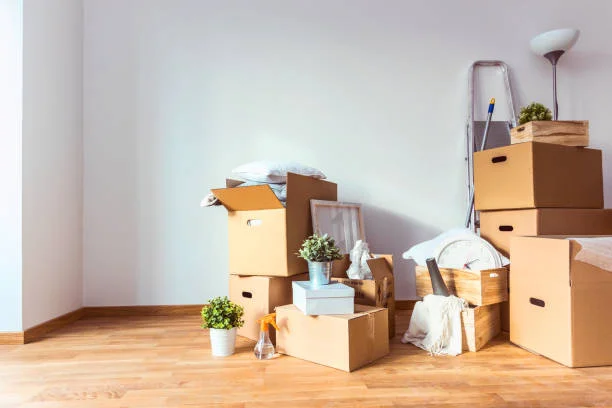 Packed boxes in an empty room